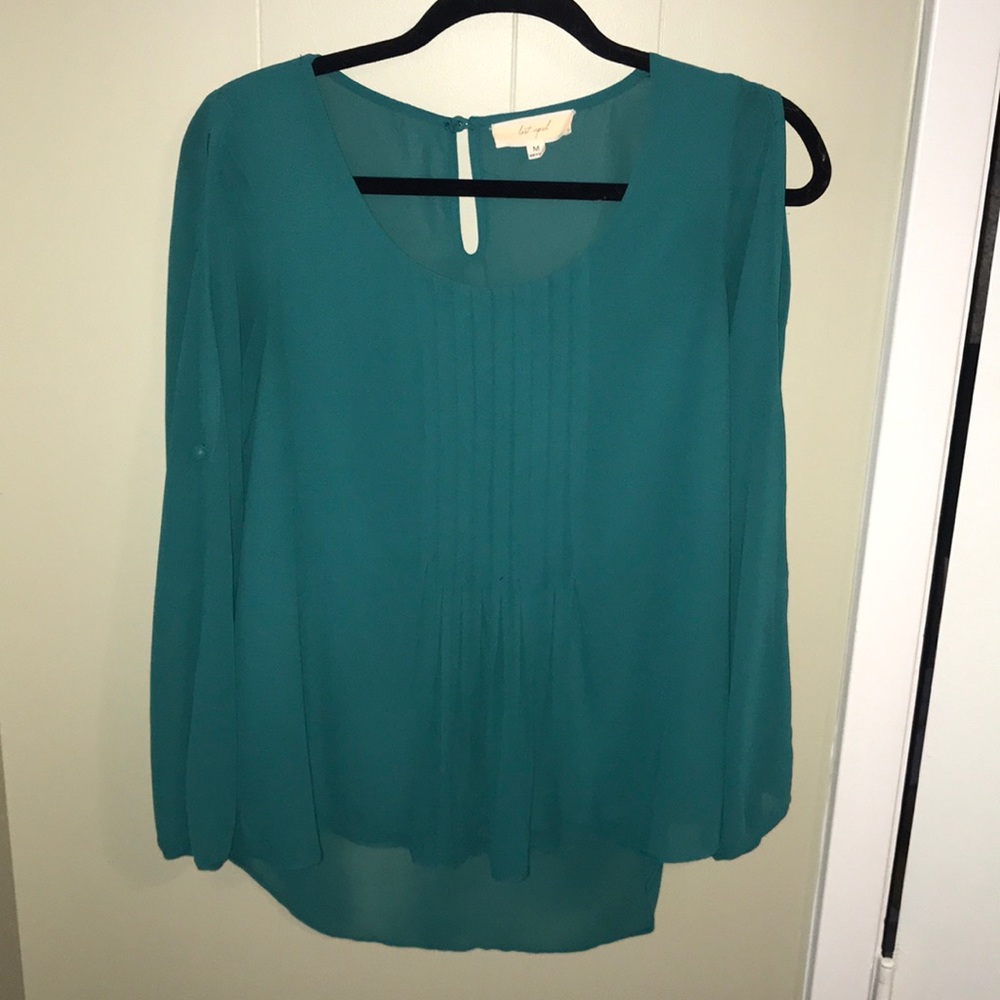 Teal blouse with open arms